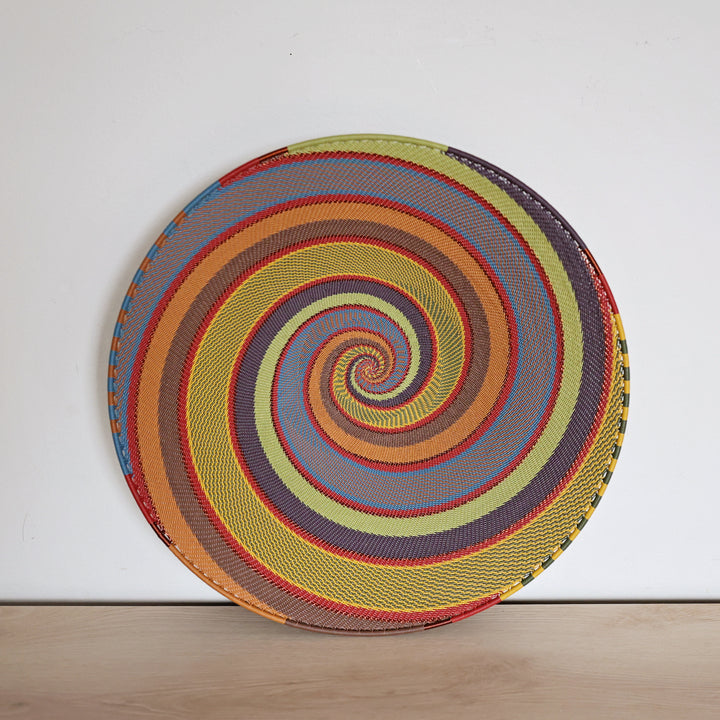 Handwoven Earthy Rainbow Zulu wire small tray with warm multicolor horizontal stripes.