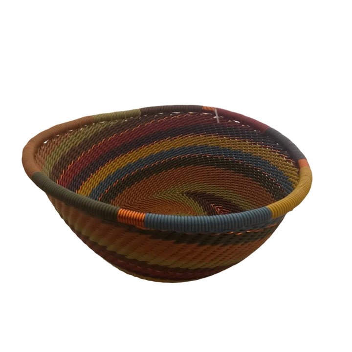 Handwoven Earthy Rainbow Zulu Wire Small Triangle Bowls from South Africa in a variety of colorful and intricate artisan patterns.