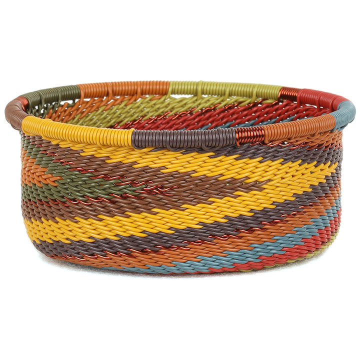 Handwoven Zulu Wire Tuna Cup Baskets in Earthy Rainbow from South Africa in a variety of colorful and neutral artisan patterns.