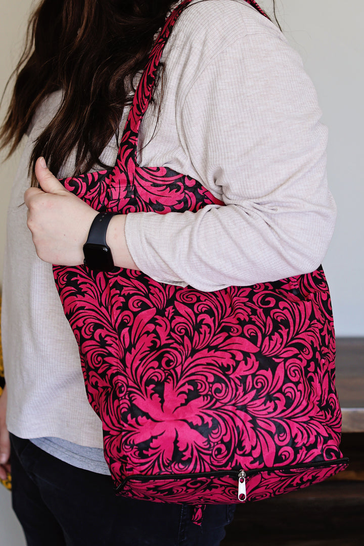 Fair trade Chitenge reusable shopping tote made from colorful African fabric.