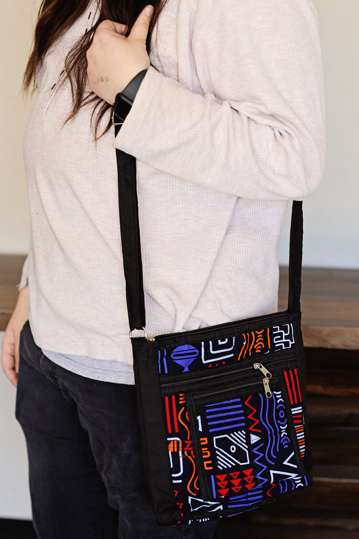 Fair trade crossbody bag worn on person for everyday travel and use