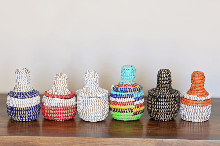 Fair trade mini sweetgrass wishing baskets, makes for colorful artisan storage.
