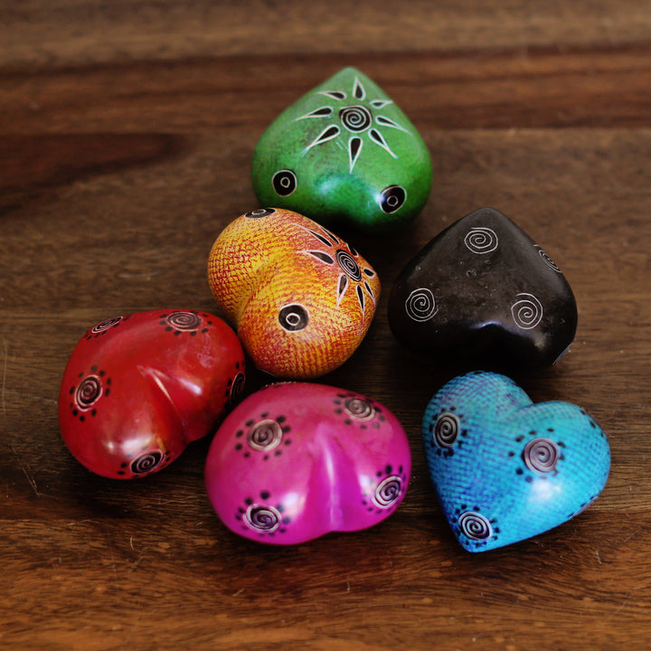 Fair trade, colorful soapstone hearts  that are hand carved in Kenya with smooth polished finish.