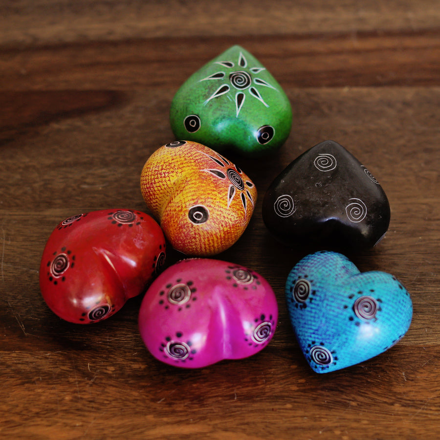 Fair trade, colorful soapstone hearts  that are hand carved in Kenya with smooth polished finish.