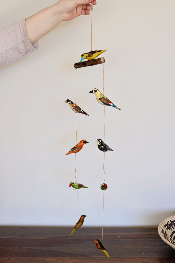 Handmade 9-bird wooden mobile with colorful painted birds in circular design
