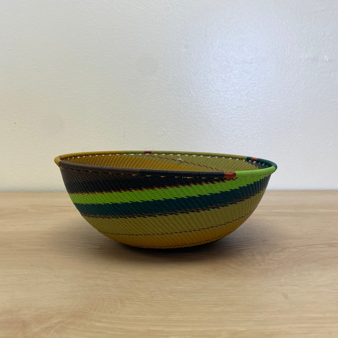 Forest Zulu Wire bowl handwoven in rich green and nature-inspired colors.