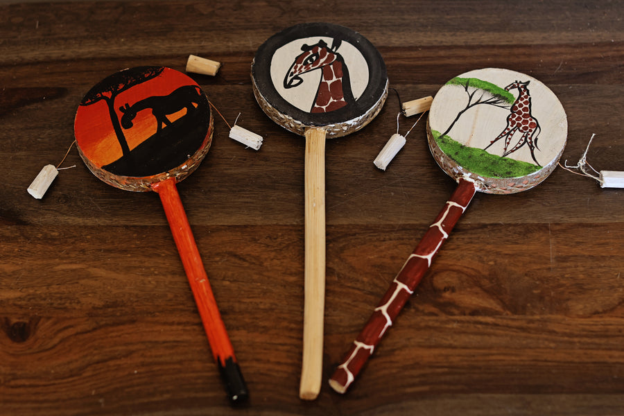 Fair trade tic toc kids toy with hand-painted giraffe design on each side, made in Africa