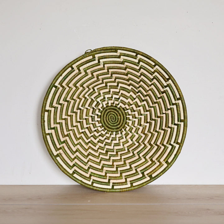 Handwoven Green & White Bukedo and Raffia bowl handmade in Uganda featuring fresh botanical colors for fair trade wall décor and home styling.