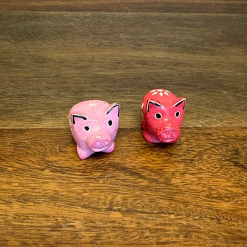 Pair of hand-carved Kisii stone pig figurines in assorted colors for home decor