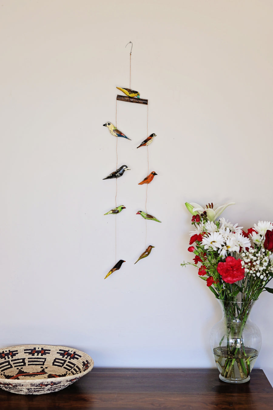 Kenyan artisan bird mobile featuring nine hand-painted wooden birds which is great hanging decor