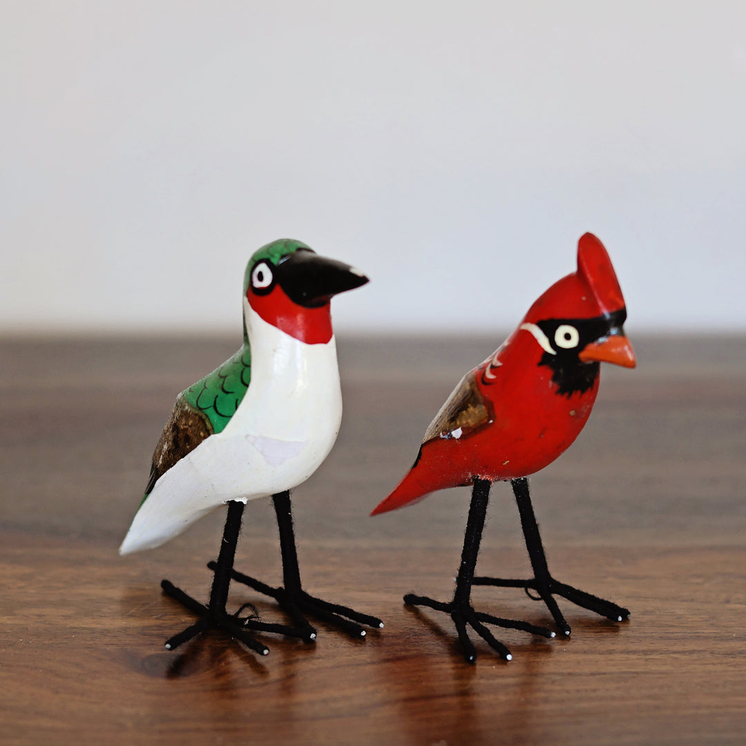 Two handmade bird figurines, hand-painted in Africa.