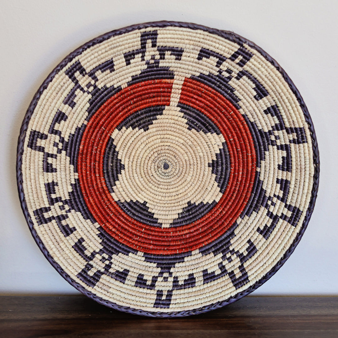 Handwoven grass bowl made from natural fibers by African artisans