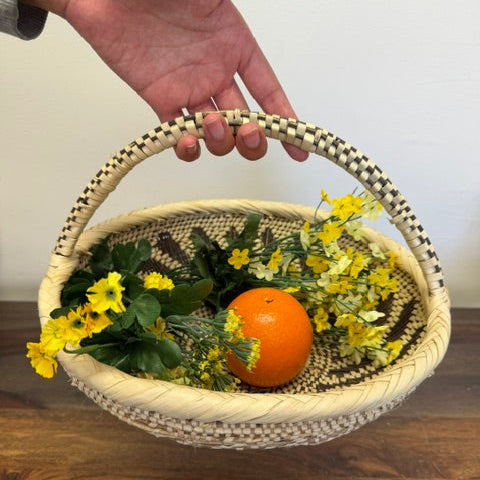 Handwoven Tonga bowl with handles used as an African serving basket and home centerpiece