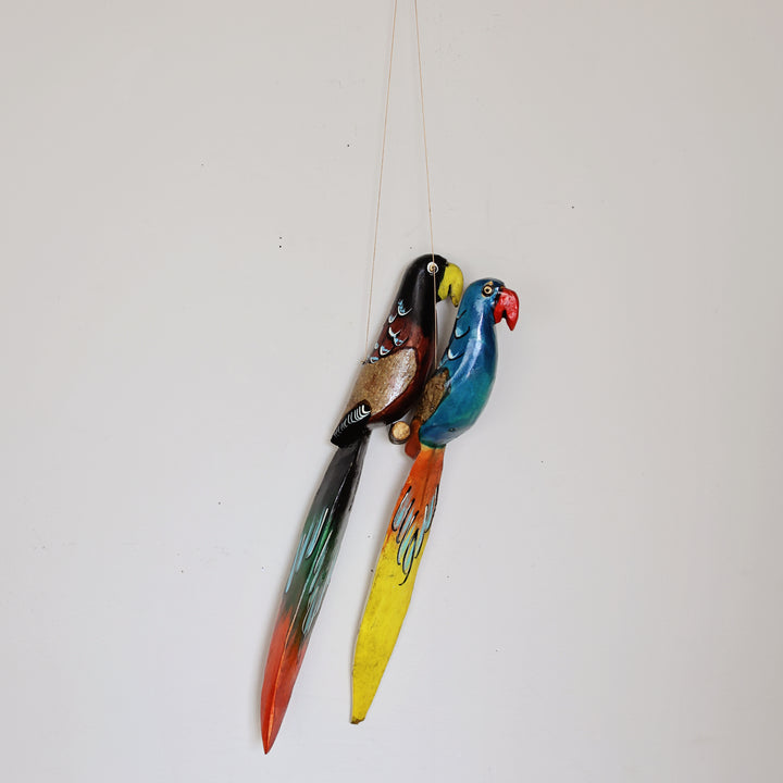 Handcrafted Hanging Wood Parrot carved from sustainable Jacaranda wood by artisans in Kenya.