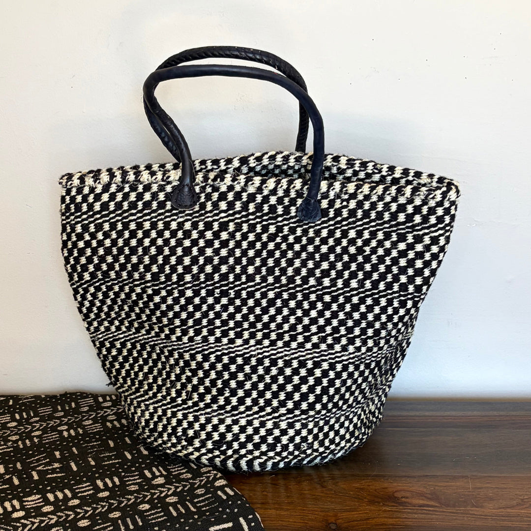 Black and white sisal everyday tote bag handwoven in Kenya with leather trim