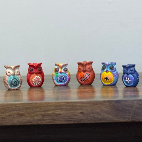 Kisii stone owl figurines in assorted colors carved by artisans in Kisii Kenya
