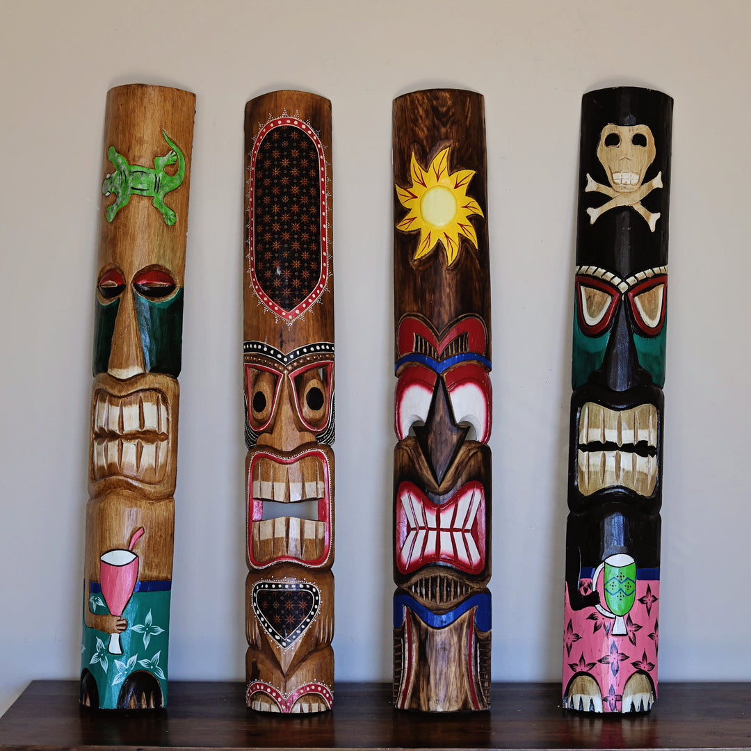 Close up detail of large bamboo tiki mask showing carved texture and craftsmanship