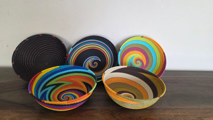 Large Zulu wire round bowl showcasing traditional South African basket weaving artistry.