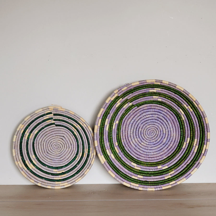 Handwoven Lavender Meadow Bukedo and Raffia bowl handmade in Uganda featuring soft lavender, sage green, and natural woven rings for fair trade home décor.