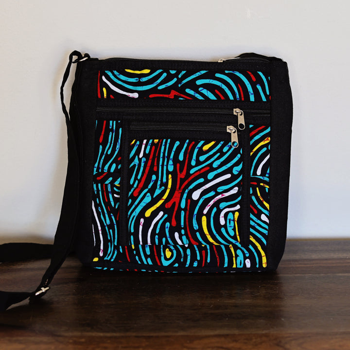 Lee fair trade travel crossbody bag made from recycled African fabric handmade in Kenya