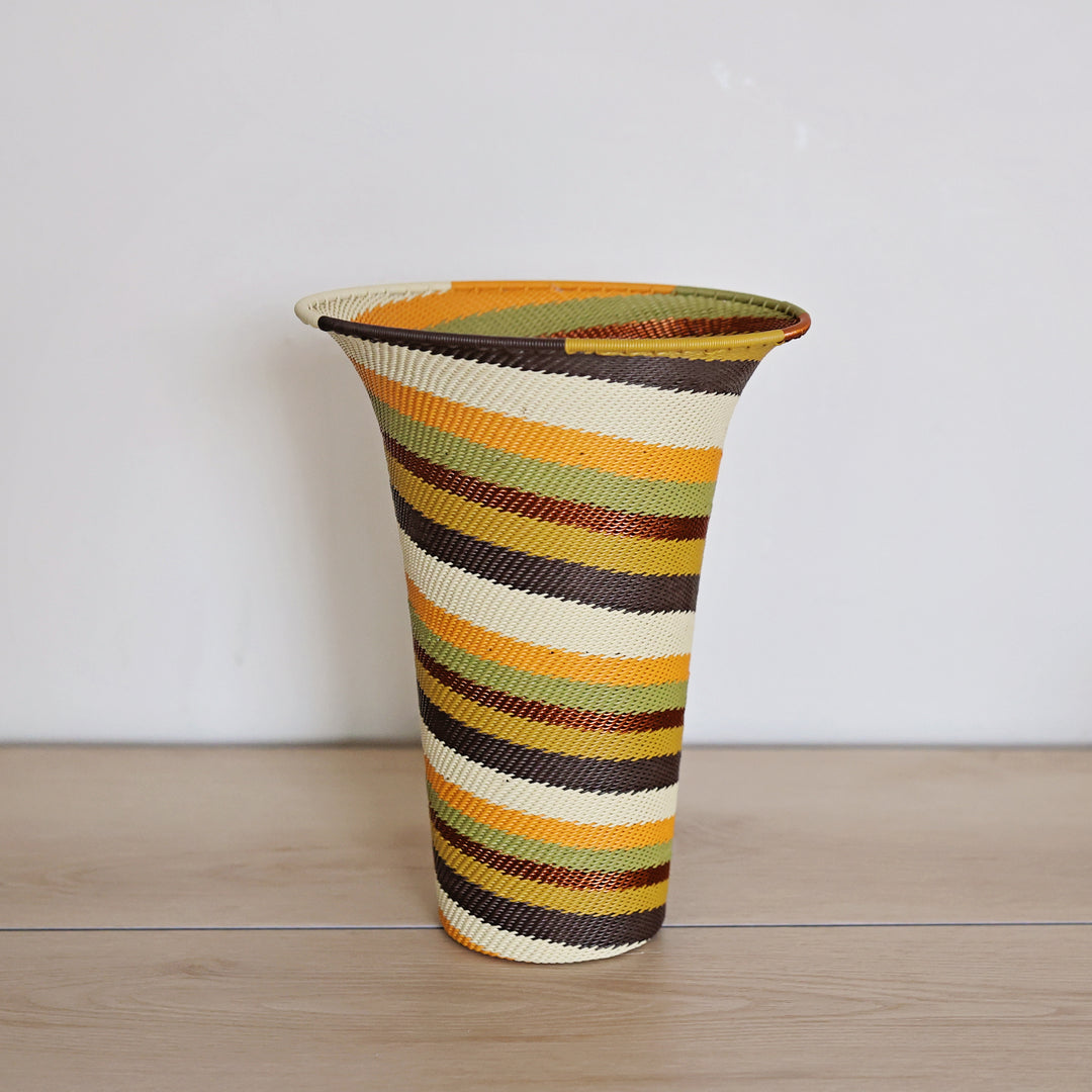 Light Earth Zulu Wire Flared Vase handwoven in South Africa in warm ivory, ochre, sage, and earthy brown tones.