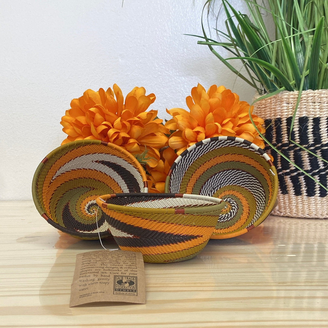 Light Earth Zulu Wire Small Bowl handwoven in South Africa in warm ivory, ochre, sage, and earthy brown tones.