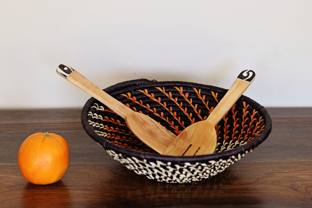Long handled batik serving set, made from wood in Kenya. 