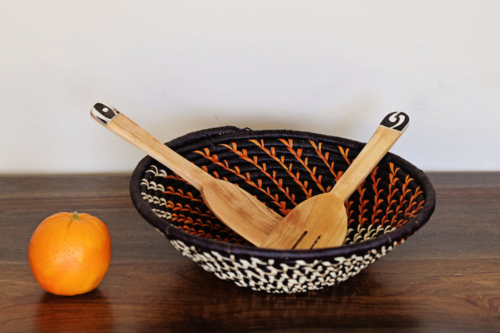 Long handled batik serving set, made from wood in Kenya. 