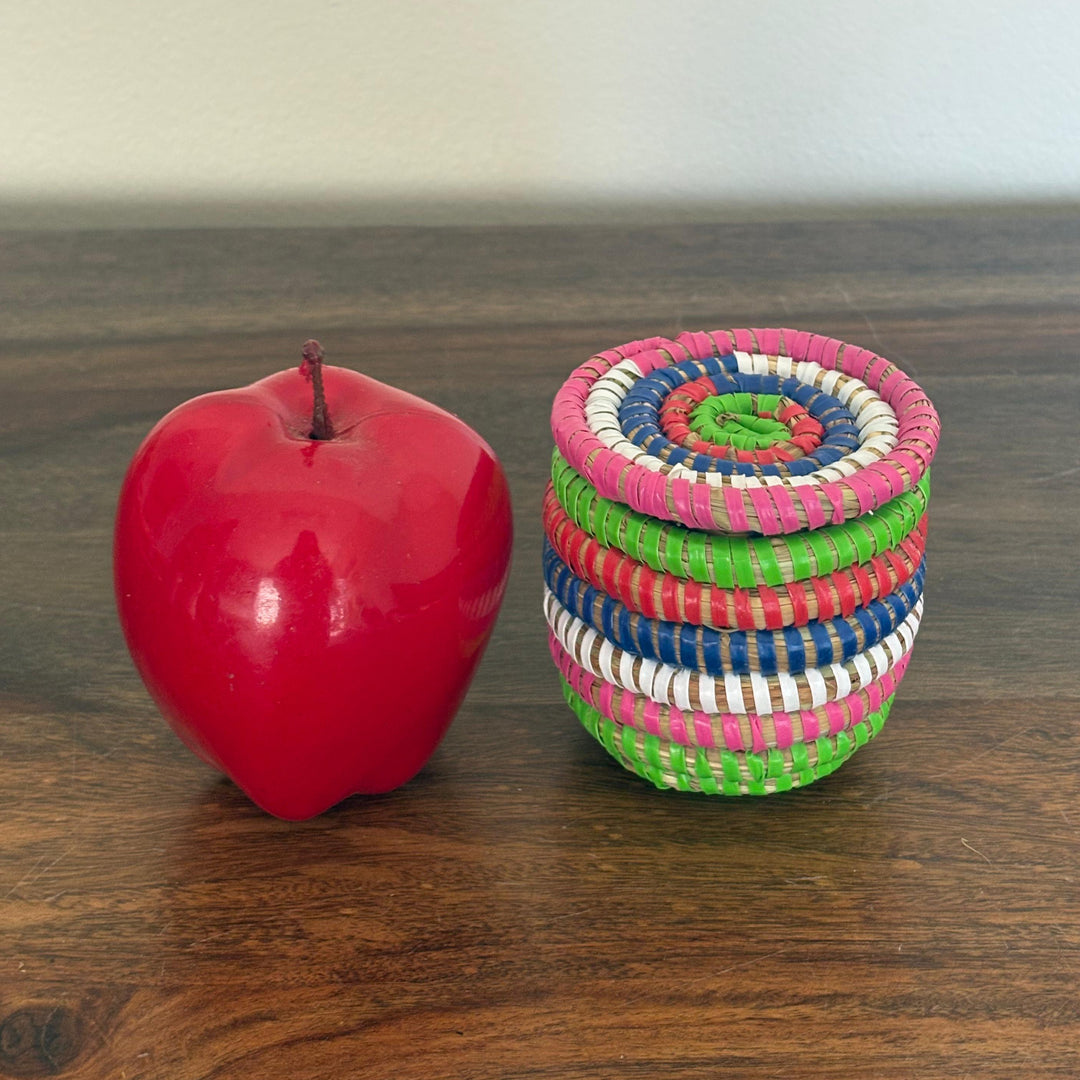 Mini sweetgrass wishing baskets with flat lids handmade by artisans in Senegal