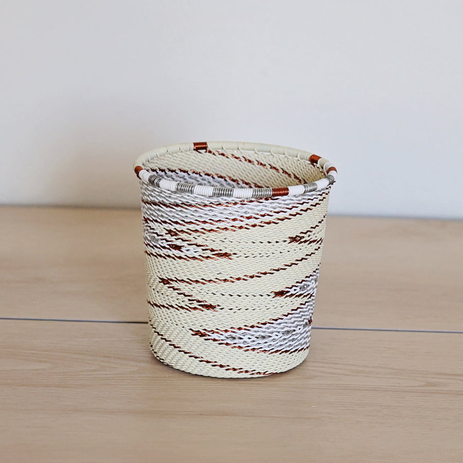 Mist Zulu Wide Base Cup handwoven in South Africa with soft mist gray and white tones in a diagonal stripe pattern.