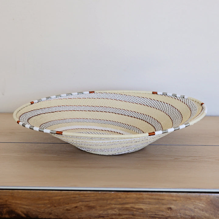 Mist Zulu Wire basket handwoven in South Africa in ivory, white, and soft gray.