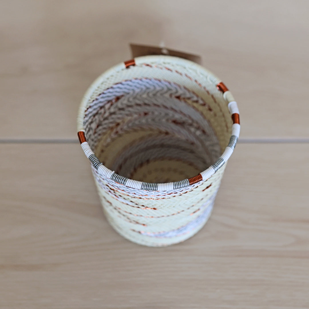 Mist Zulu Wire Wide Base Cup handwoven in South Africa in ivory, white, and soft gray.