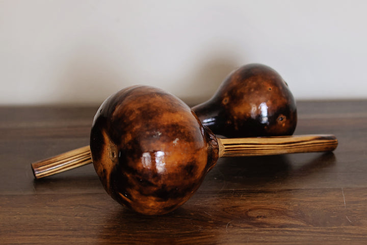 Natural gourd maraca handcrafted in Kenya using traditional artisan techniques