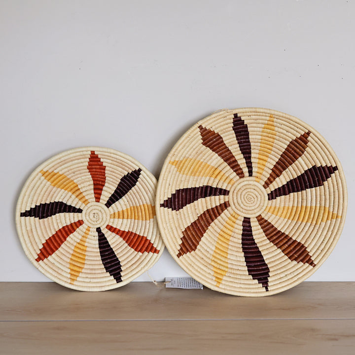 Handwoven Natural Leaf Bukedo and Raffia bowl handmade in Uganda featuring a botanical leaf design for fair trade wall décor.