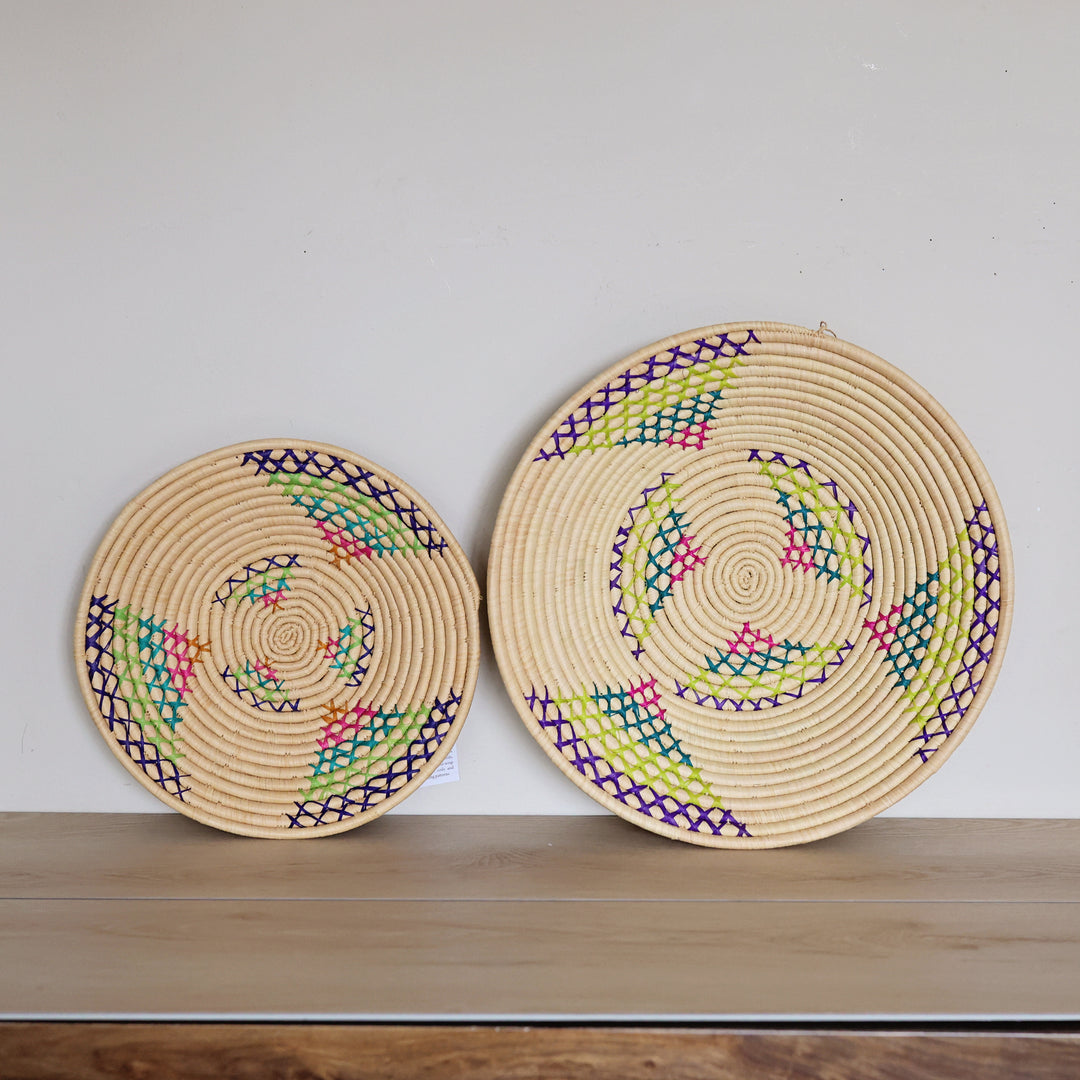Handwoven Natural & Rainbow Bukedo and Raffia bowl handmade in Uganda with colorful woven accents for fair trade wall décor.