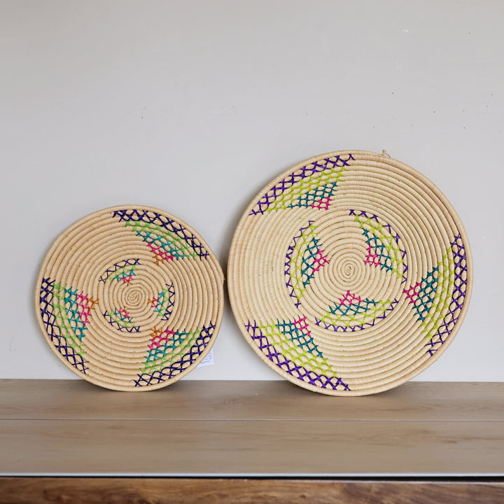 Handwoven Natural & Rainbow Bukedo and Raffia bowl handmade in Uganda with colorful woven accents for fair trade wall décor.
