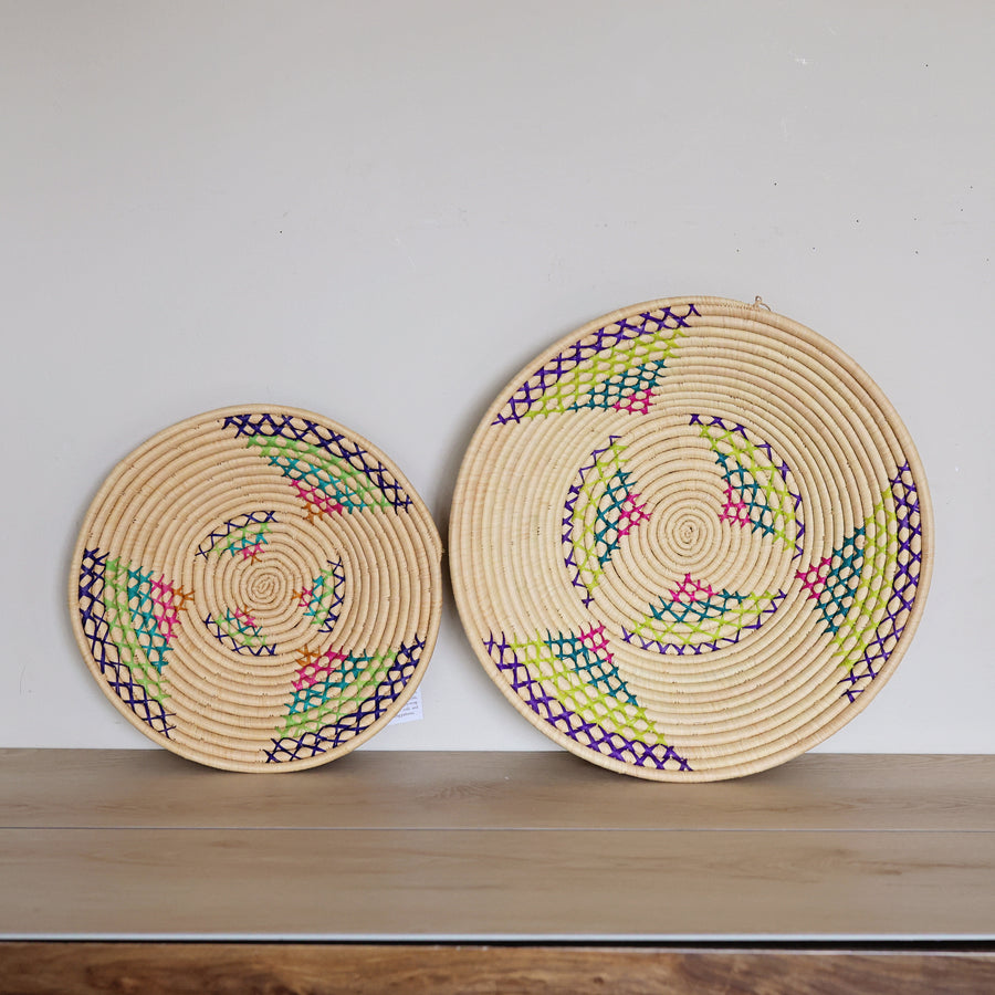 Handwoven Natural & Rainbow Bukedo and Raffia bowl handmade in Uganda with colorful woven accents for fair trade wall décor.