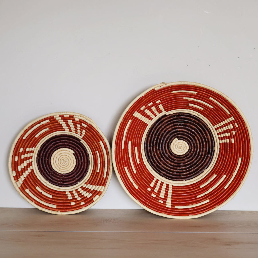 Handwoven Natural & Red Bukedo and Raffia bowl handmade in Uganda with bold red geometric patterns for fair trade wall décor.