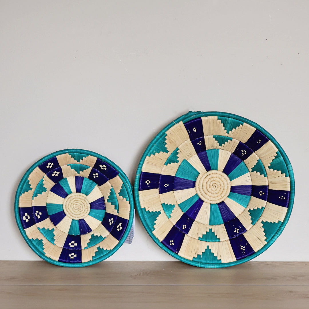 Handwoven Natural & Teal Bukedo and Raffia bowl handmade in Uganda with teal geometric patterns for fair trade wall décor.