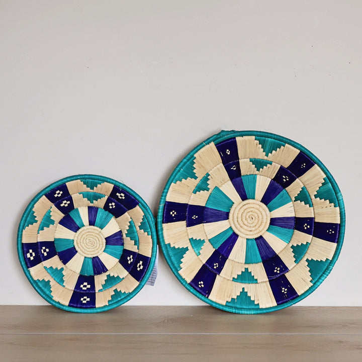 Handwoven Natural & Teal Bukedo and Raffia bowl handmade in Uganda with teal geometric patterns for fair trade wall décor.