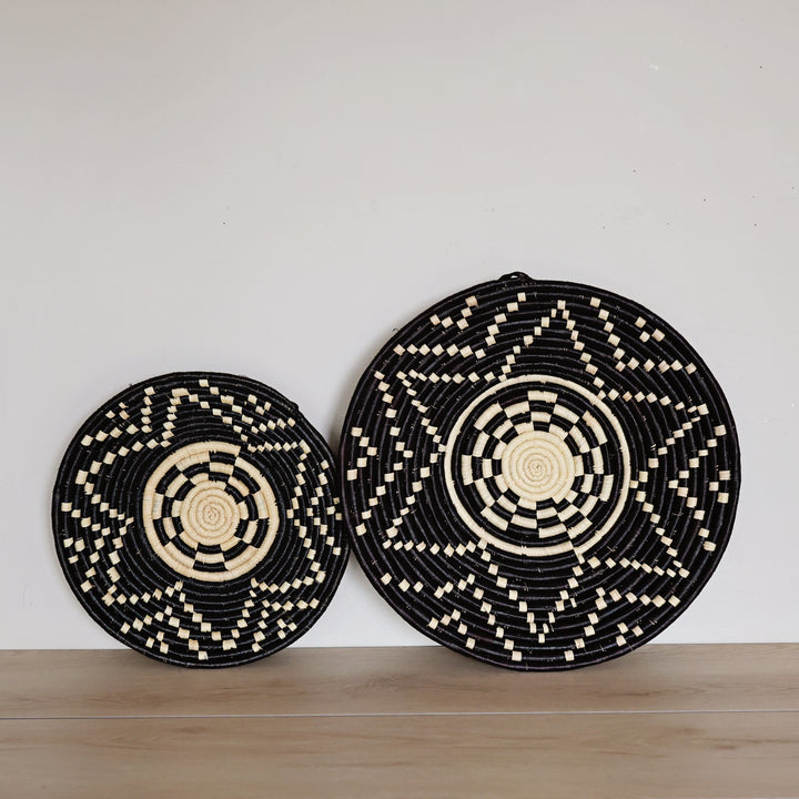 Handwoven Night Sky Bukedo and Raffia bowl handmade in Uganda featuring a black and natural geometric pattern inspired by a starlit sky for fair trade home décor.