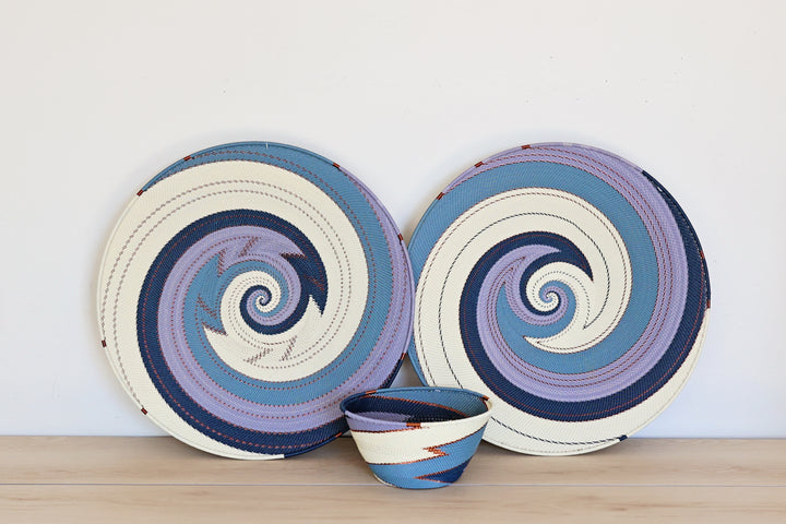 Handmade collection of the Ocean Zulu Deep baskets featuring intricate handwoven wire craftsmanship in vibrant ocean blue tones.