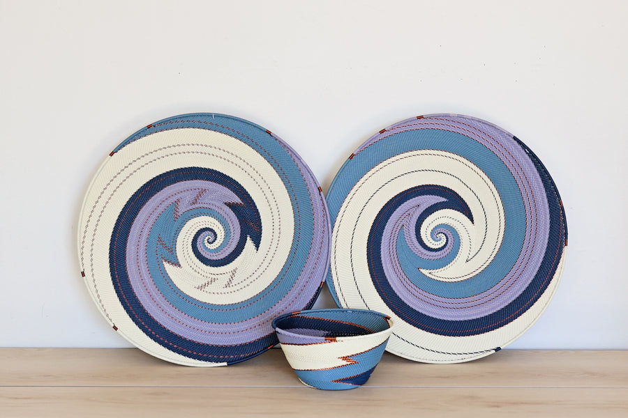 Handmade collection of the Ocean Zulu Deep baskets featuring intricate handwoven wire craftsmanship in vibrant ocean blue tones.