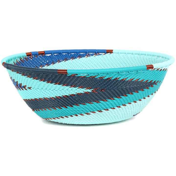Handwoven Ocean Zulu Wire Medium Bowls from South Africa in a variety of colorful and intricate artisan patterns.