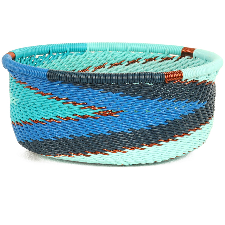 Handwoven Zulu Wire Tuna Cup Baskets in Ocean from South Africa in a variety of colorful and neutral artisan patterns.