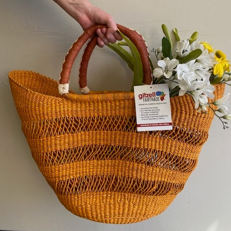 Fair-trade orange open weave basket, perfect for markets and the beach, made in Africa by artisans.