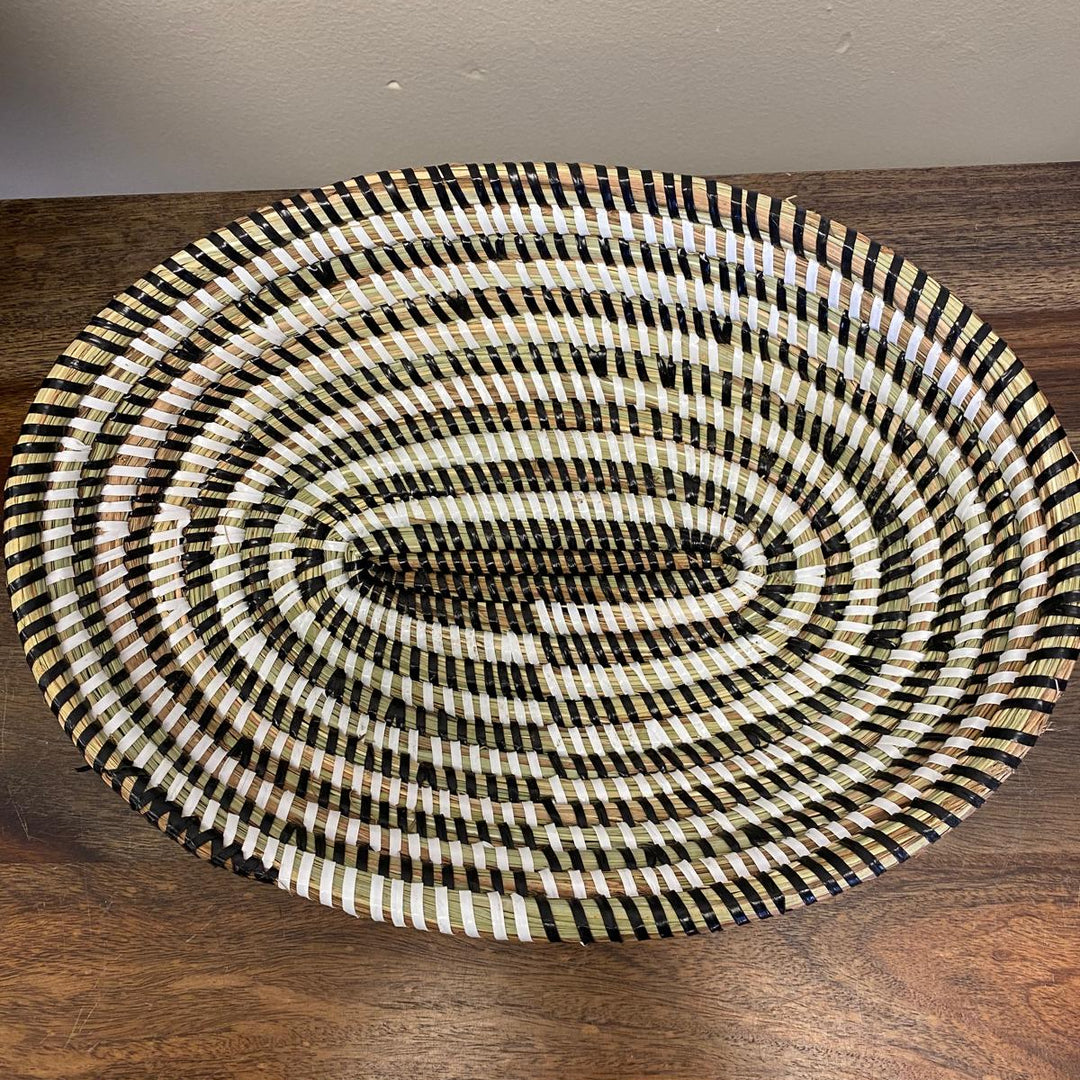 Oval woven bread basket made from natural fiber sweetgrass