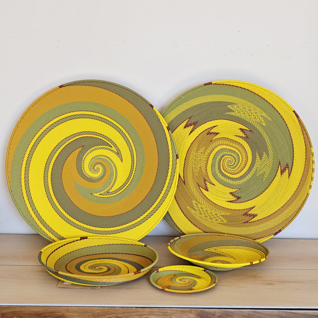 Assorted Papaya Zulu Wire Baskets handwoven in South Africa in sunny yellow and warm papaya orange patterns.