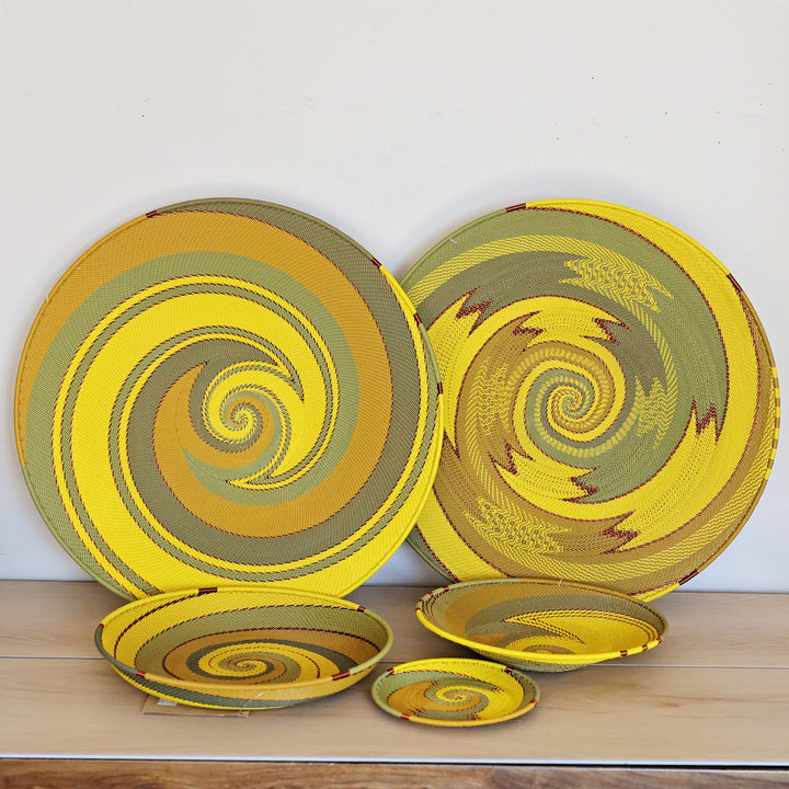 Assorted Papaya Zulu Wire Baskets handwoven in South Africa in sunny yellow and warm papaya orange patterns.