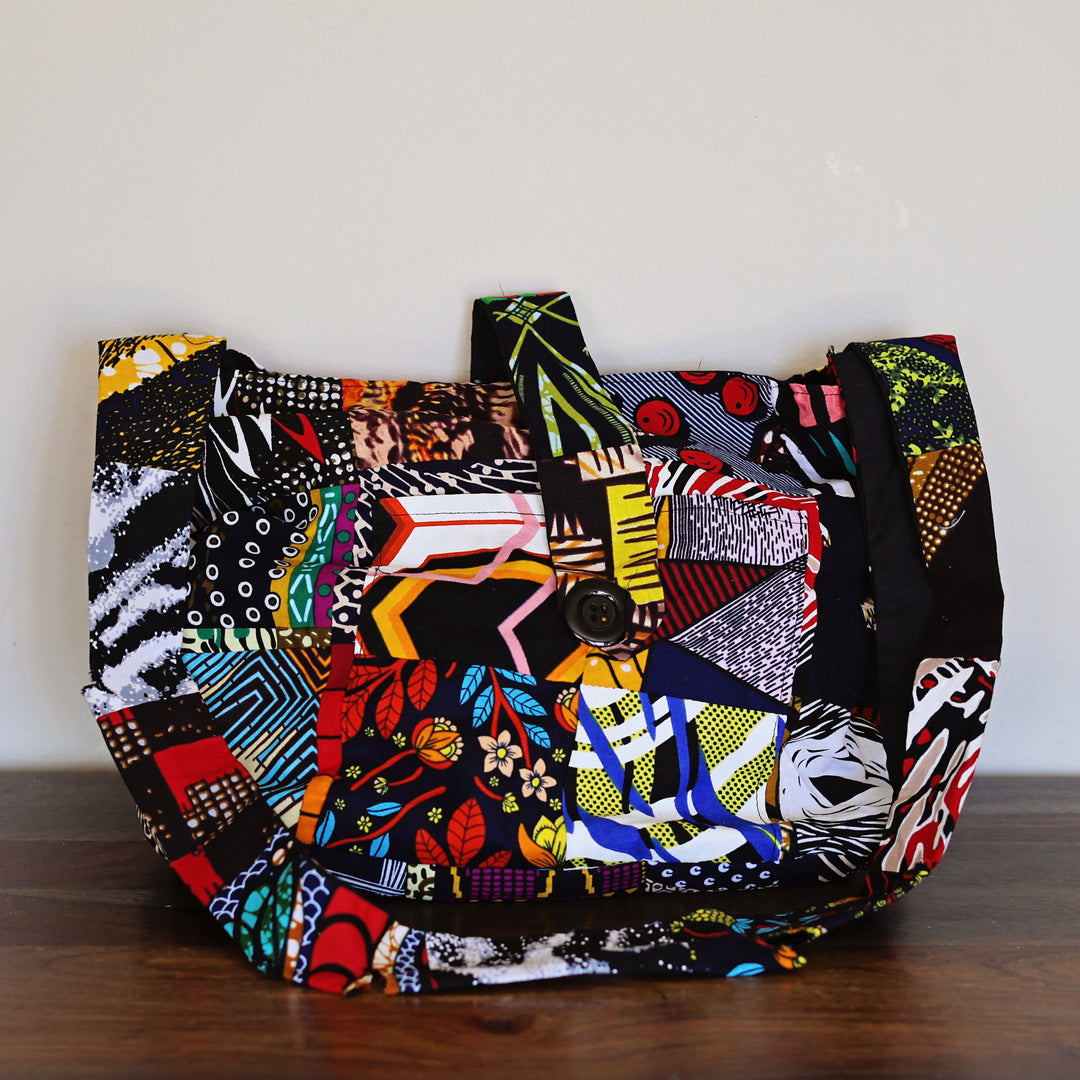 Fair trade patchwork crossbody sling bag made from recycled fabric handmade in Kenya